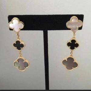 3-tone long yellow gold plated earrings